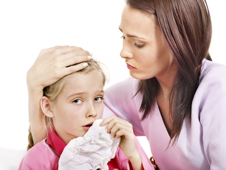 Sick little girl with mother. Isolated.の写真素材