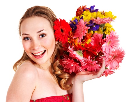 Beautiful  young woman holding  flowers.の写真素材