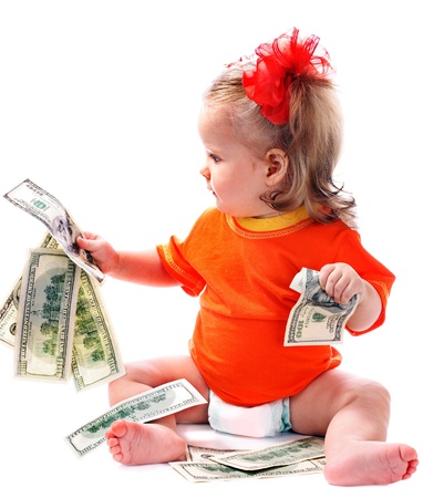 Child with euro money. Business concept.How much it costs to have a baby?の写真素材