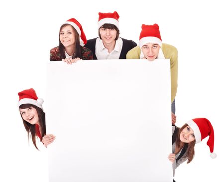Happy group  people  in santa hat whith banner. Isolated.の写真素材