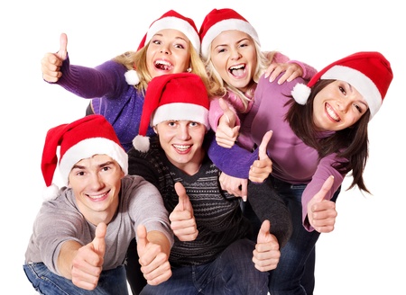 Group young people in santa hat showing thumb up. Isolated.の写真素材