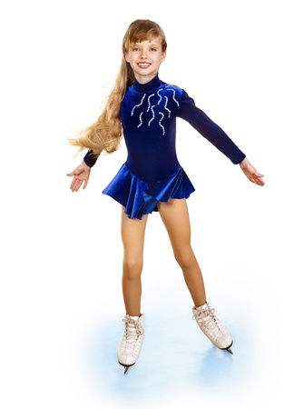 Happy young girl figure skating. Isolated.の写真素材