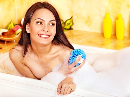Young woman take bubble  bath.の写真素材