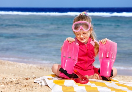 Little girl  playing on  beach.の写真素材