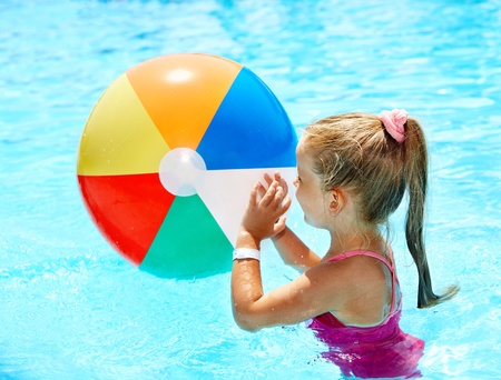 Little girl  swimming in pool.の写真素材