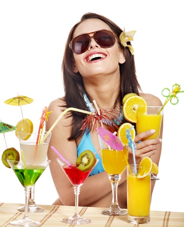 Girl in bikini on beach drinking cocktail. Isolated.の写真素材