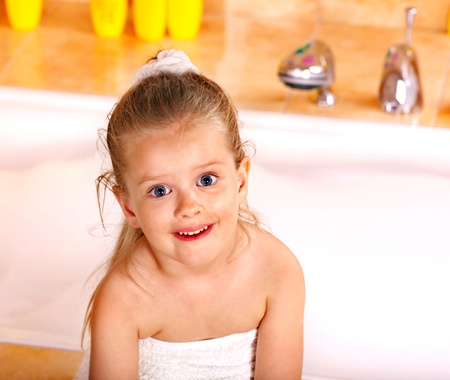 Child washing in bubble bath .の写真素材