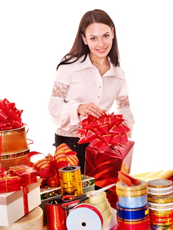 Girl with group of color gift box. Isolated.の写真素材