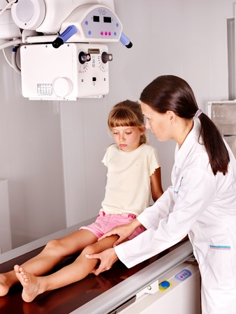 Little girl with doctor radiologist.の写真素材