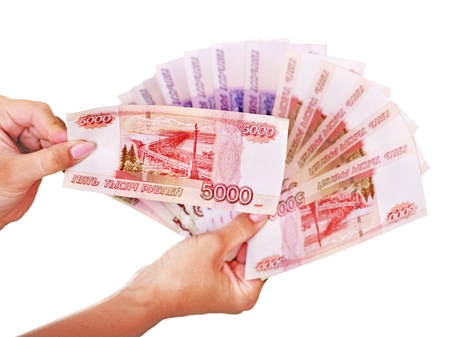 Female hand with  money (Russian rouble). Isolated.の写真素材