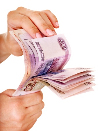 Female hand with  money (Russian rouble). Isolated.の写真素材