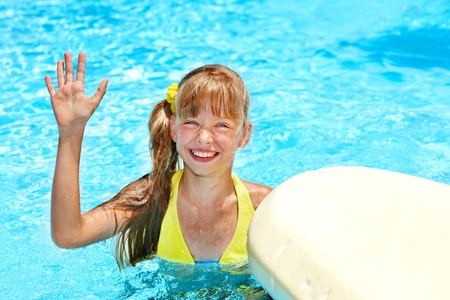 Child in swimming pool. Water sport.の写真素材