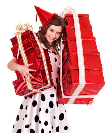 Girl in party hat holding group of gift box. Isolated.の写真素材