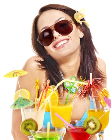 Girl in bikini on beach drinking cocktail. Isolated.の写真素材
