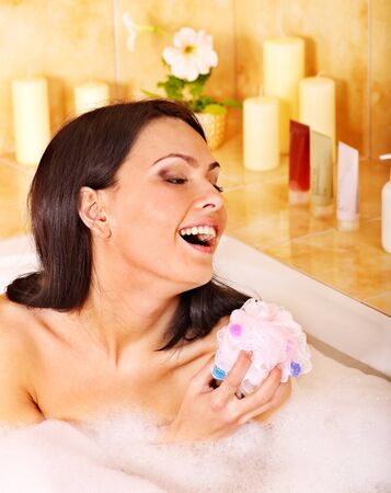 Young woman take bubble  bath.の写真素材