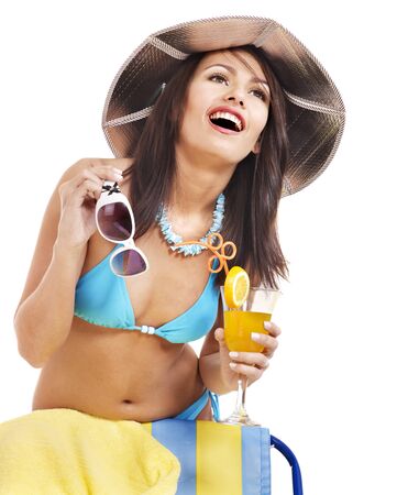 Girl in bikini drink juice through  straw. Isolated.の写真素材