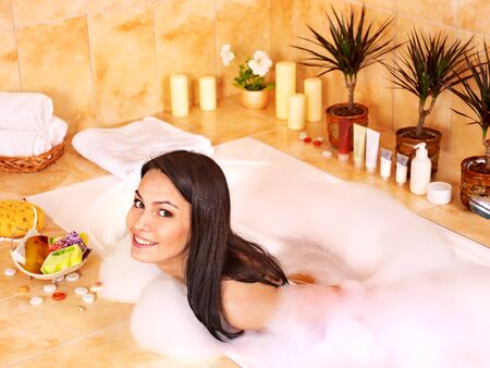 Young woman take bubble  bath.の写真素材