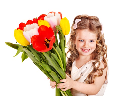 Little girl with spring flower . Isolated.の写真素材