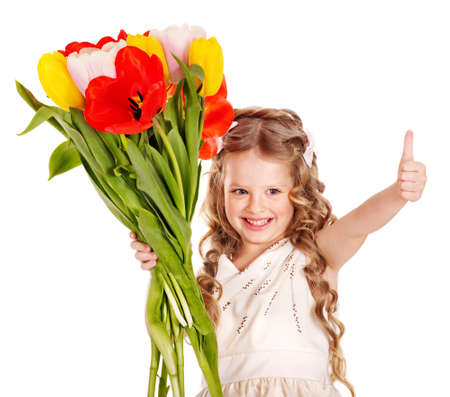 Little girl with spring flower . Isolated.の写真素材