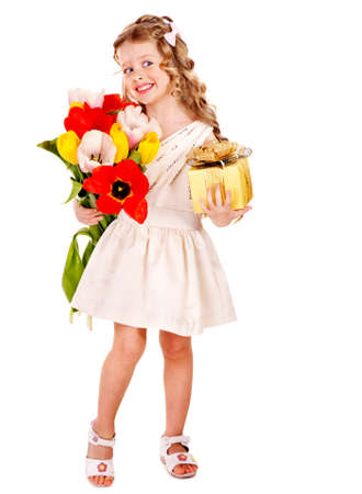 Little girl with spring flower and gift box. Isolated.の写真素材