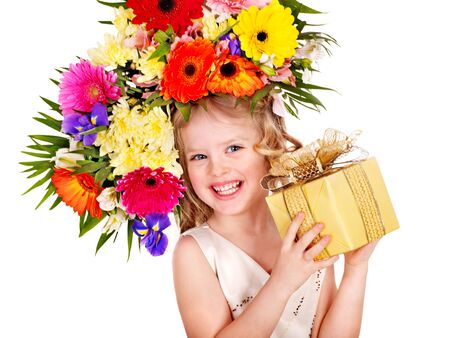 Little girl with spring flower and gift box. Isolated.の写真素材