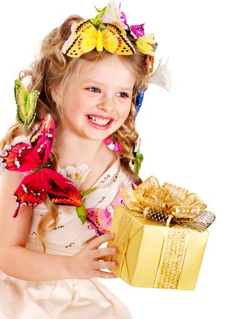 Little girl with butterfly holding gift box. Isolated.の写真素材