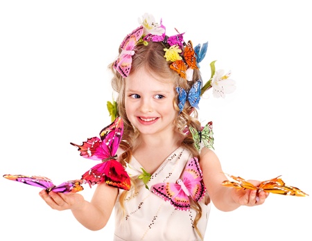 Little girl in spring hairstyle and butterfly. Isolated.の写真素材
