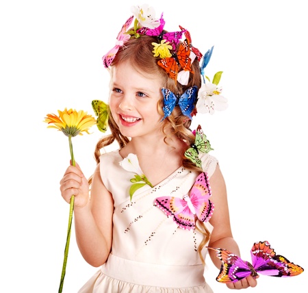 Little girl in spring hairstyle and butterfly. Isolated.の写真素材
