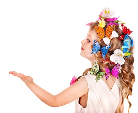 Little girl in spring hairstyle and butterfly. Isolated.の写真素材