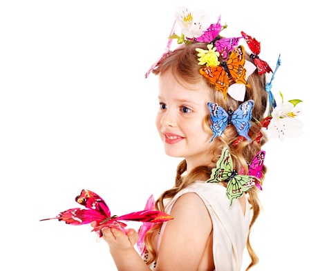 Little girl in spring hairstyle and butterfly. Isolated.の写真素材