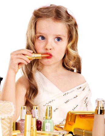 Child cosmetics. Little girl with lipstick. Isolated.の写真素材