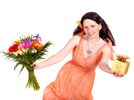 Girl with spring flower and gift box. Isolated.の写真素材