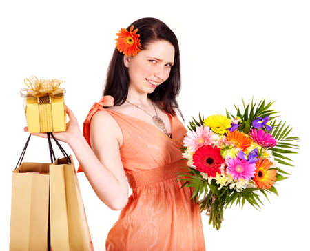 Girl with spring flower, gift box and shopping bag.  Isolated.の写真素材