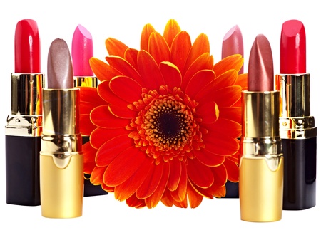 Lipstick group and flower. Decorative cosmetics. Isolated.の写真素材