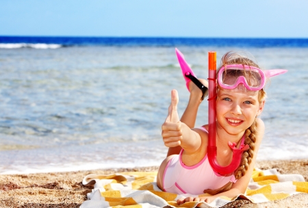 Little girl  playing on  beach.の写真素材