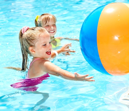 Little girl  swimming in pool.の写真素材