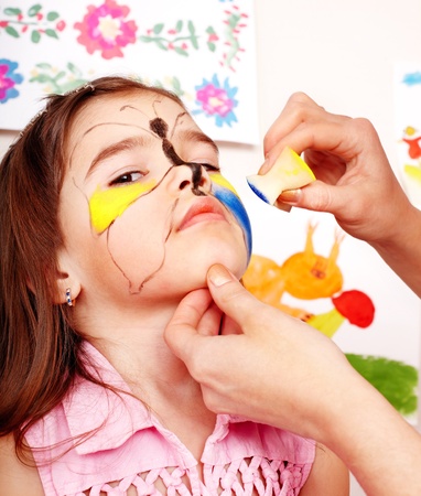 Child with face painting. Make up.の写真素材