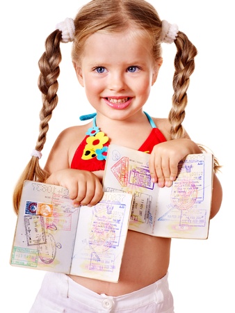 Little girl holding international passport. Isolated.の写真素材