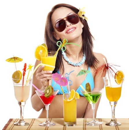 Girl in bikini on beach drinking cocktail. Isolated.の写真素材
