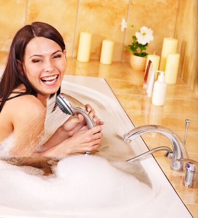 Young woman take bubble  bath.の写真素材