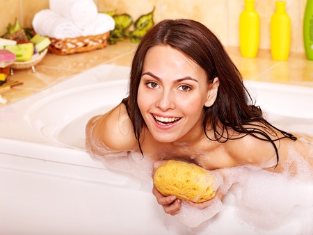 Young woman take bubble  bath.の写真素材