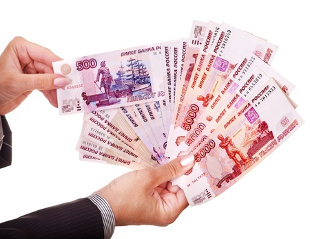 Female hand with  money (Russian rouble). Isolated.の写真素材