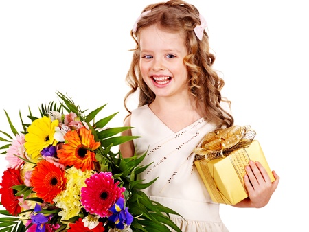 Little girl with spring flower and gift box. Isolated.の写真素材