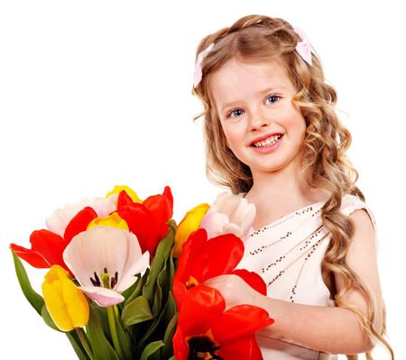 Little girl with spring flower . Isolated.の写真素材