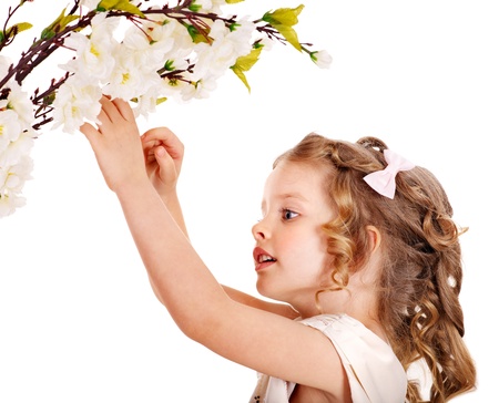 Little girl with spring flower . Isolated.の写真素材