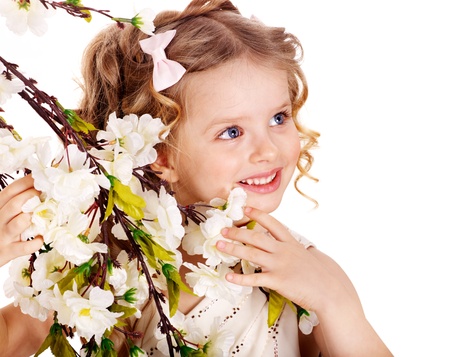 Little girl with spring flower . Isolated.の写真素材