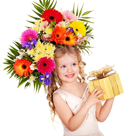 Little girl with spring flower and gift box. Isolated.の写真素材