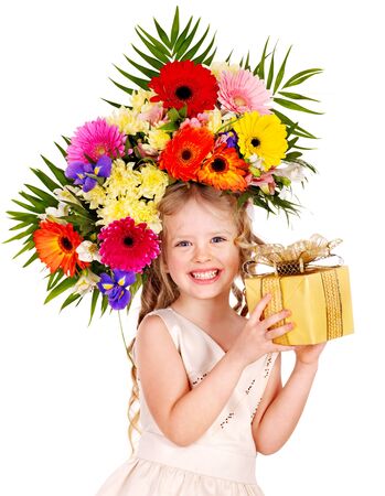 Little girl with spring flower and gift box. Isolated.の写真素材