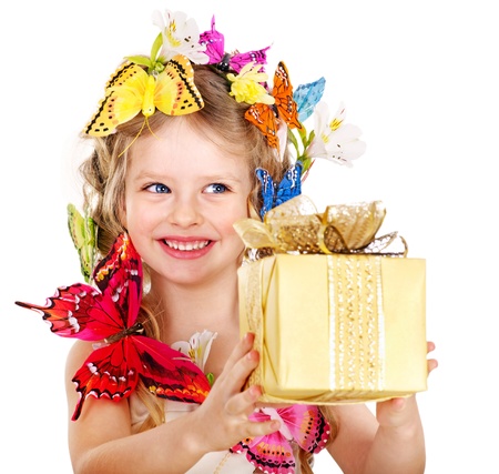 Little girl with butterfly holding gift box. Isolated.の写真素材