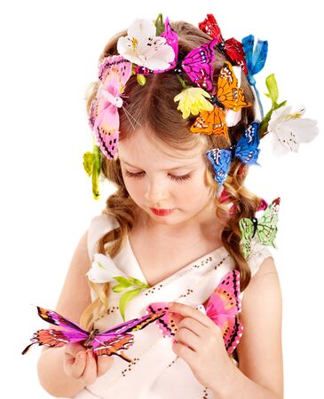 Little girl in spring hairstyle and butterfly. Isolated.の写真素材